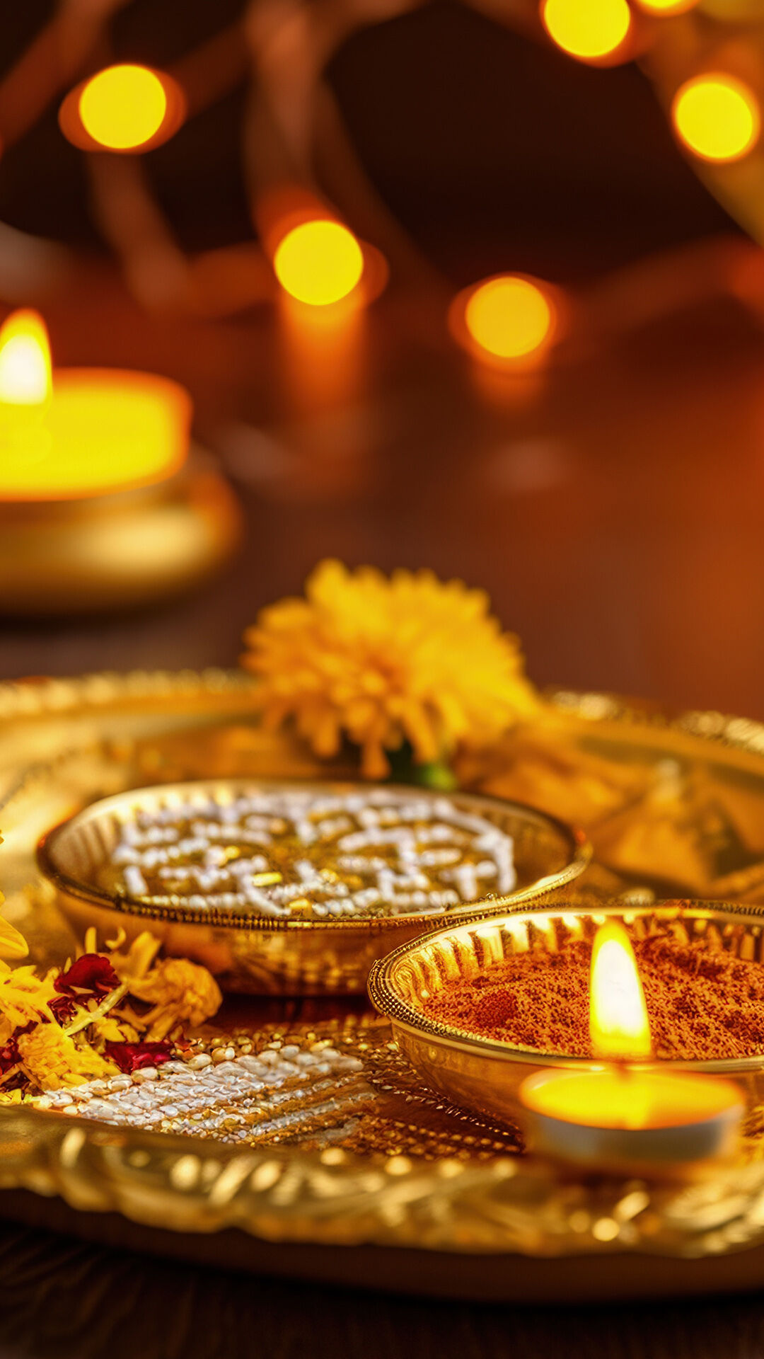 Beautifully decorated festive thali with diya, kumkum, marigold flower and traditional pooja items glowing with warm lights.